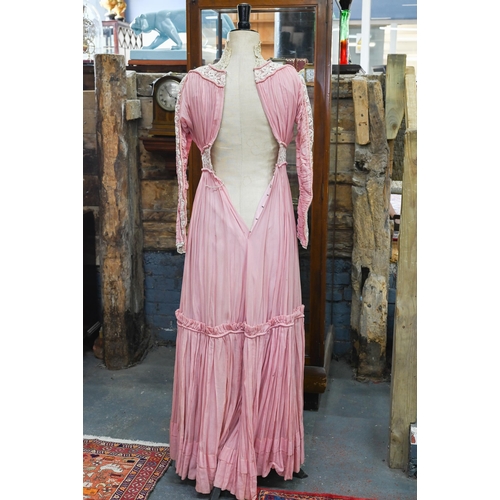 967 - An Edwardian pink silk, lace and crochet dress, 150 cm from collar to hem