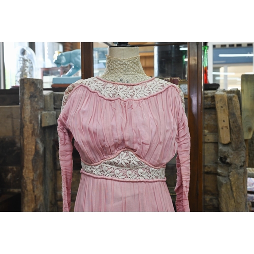 967 - An Edwardian pink silk, lace and crochet dress, 150 cm from collar to hem