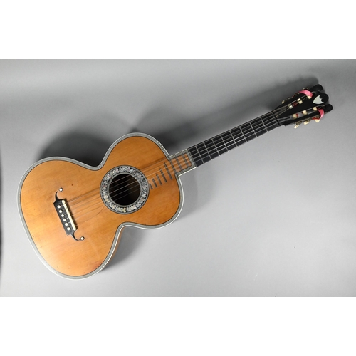 976 - A fine quality 19th century French guitar, with bird's eye maple body, length of back 42 cm, pine so... 