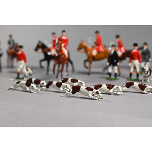 980 - A Britain's die-cast fox-hunt set, with eight mounted figures and five figures on foot, sixteen houn... 