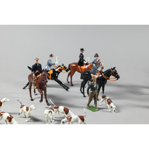 980 - A Britain's die-cast fox-hunt set, with eight mounted figures and five figures on foot, sixteen houn... 