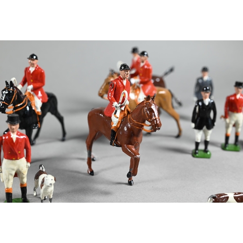 980 - A Britain's die-cast fox-hunt set, with eight mounted figures and five figures on foot, sixteen houn... 