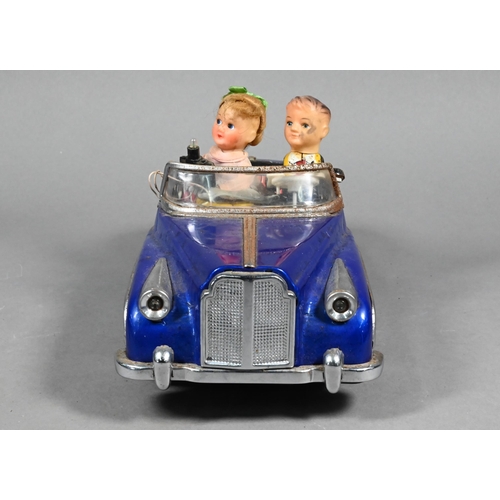 981 - A Chinese tinplate 'Photoing in Car' model - blue Bentley, with automaton driver, the passenger with... 