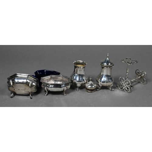 99 - Two silver pepper pots, London 1903, pair of salts Birmingham 1912 and two mustards to/w a pair of E... 