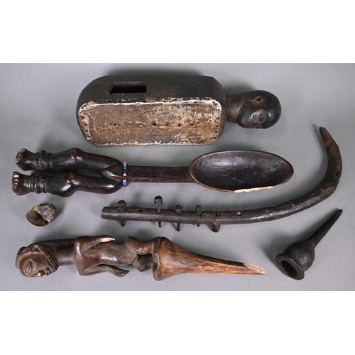 996 - A collection of African tribal wood carvings and other artefacts, including figural spoons, instrume... 