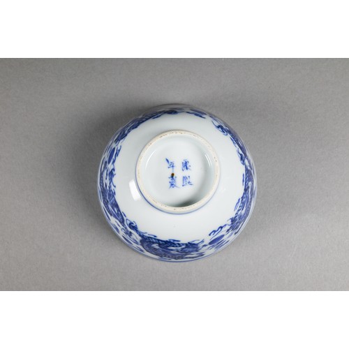 353 - A pair of 19th century Chinese blue and white tea bowls painted in underglaze blue with a figure lea... 