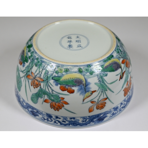 320 - A Chinese 18th century doucai 'duck and lotus' marriage bowl, finely painted in polychrome enamels w... 