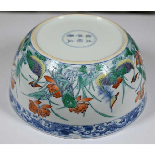 320 - A Chinese 18th century doucai 'duck and lotus' marriage bowl, finely painted in polychrome enamels w... 