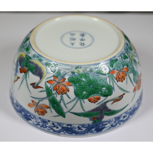 320 - A Chinese 18th century doucai 'duck and lotus' marriage bowl, finely painted in polychrome enamels w... 