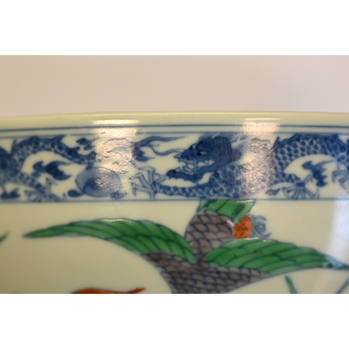 320 - A Chinese 18th century doucai 'duck and lotus' marriage bowl, finely painted in polychrome enamels w... 