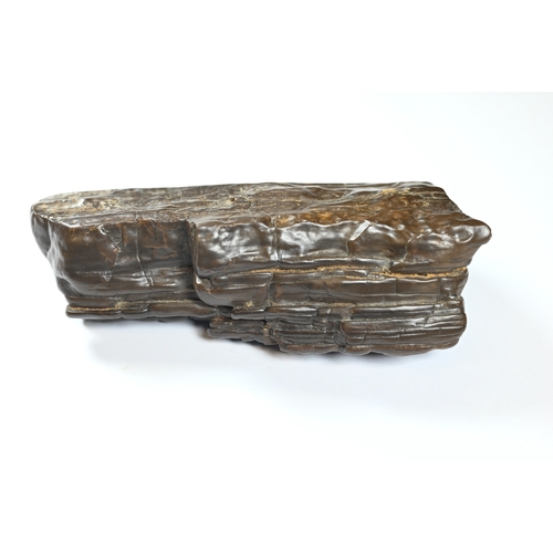 366 - A Chinese scholar's rock, gongshi, of rugged mountain form with dramatic textured surface, 12.5 cm h... 