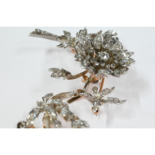 209 - A 19th century Continental diamond-set brooch en trembleuse, in three parts, in the form of an open ... 