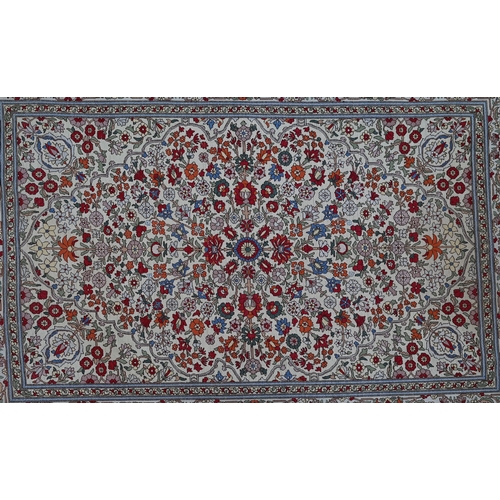 903 - A fine Turkish Hereke silk rug, the yellow/ochre ground centred by a floral medallion, 150 cm x 102 ... 