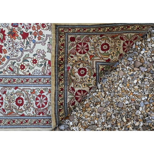 903 - A fine Turkish Hereke silk rug, the yellow/ochre ground centred by a floral medallion, 150 cm x 102 ... 