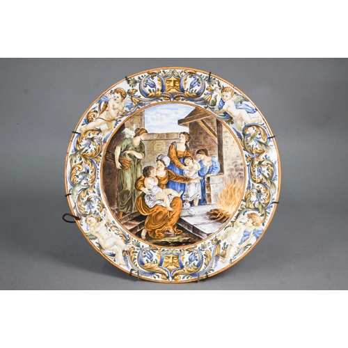 404 - Two 18th century Italian Castelli majolica chargers, painted with Moses and the Princess of Egypt an... 
