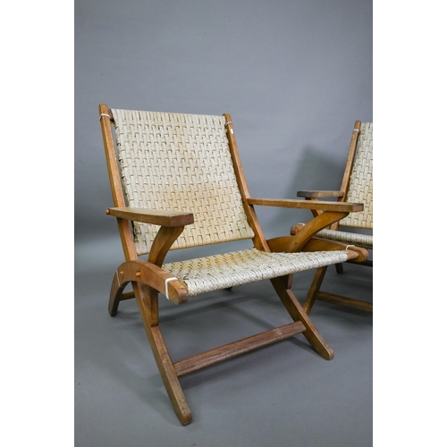 752 - A pair of Danish style hardwood and cane chairs, probably of African origin (2)