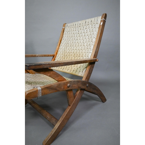 752 - A pair of Danish style hardwood and cane chairs, probably of African origin (2)