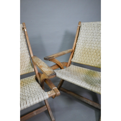 752 - A pair of Danish style hardwood and cane chairs, probably of African origin (2)