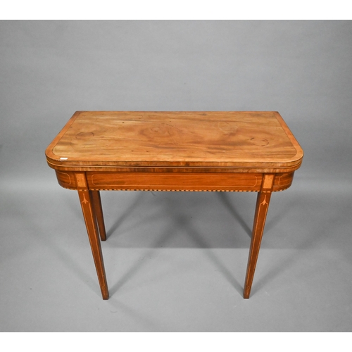 777 - A Regency mahogany fold-over card table, raised on twin gate-legs, 92 cm x 46 cm x 75 cm h - a/f