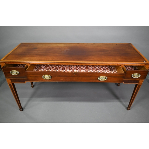 781 - A converted George III cross-banded mahogany spinet to a three drawer sideboard, raised on square ta... 