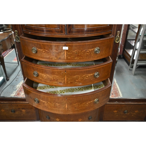 783 - A Victorian Sheraton Revival bowfront compactum, centred by a bowfront twin cupboard enclosing linen... 