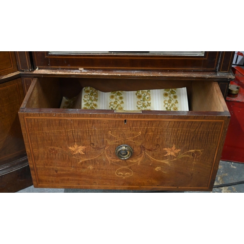 783 - A Victorian Sheraton Revival bowfront compactum, centred by a bowfront twin cupboard enclosing linen... 