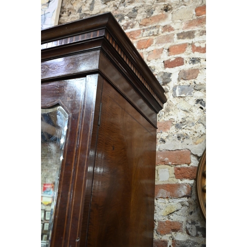 783 - A Victorian Sheraton Revival bowfront compactum, centred by a bowfront twin cupboard enclosing linen... 