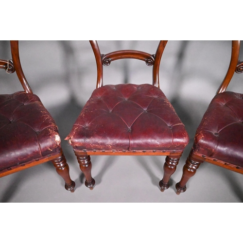 793A - A set of four mahogany framed balloon back dining side chairs, with overstuffed buttoned leather sea... 