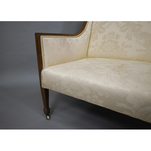 803 - A Sheraton Revival satinwood framed high back sofa, raised on square section front legs to brass cas... 