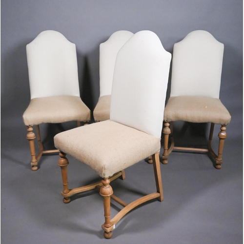 812 - A set of four traditional style high hump-back beech framed dining side chairs, upholstered in calic... 