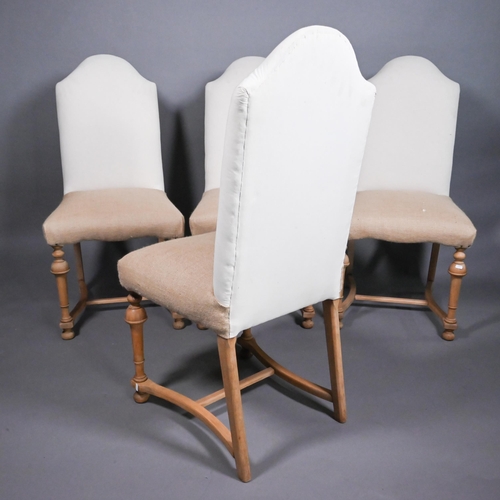 812 - A set of four traditional style high hump-back beech framed dining side chairs, upholstered in calic... 