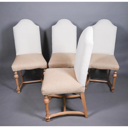 812 - A set of four traditional style high hump-back beech framed dining side chairs, upholstered in calic... 