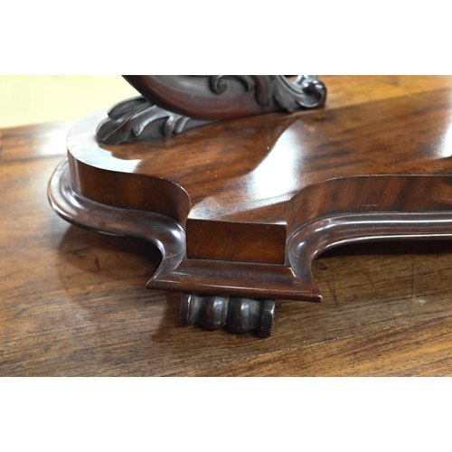 818 - A large Victorian mahogany toilet mirror raised on a serpentine platform base on scroll feet, 67 x 3... 