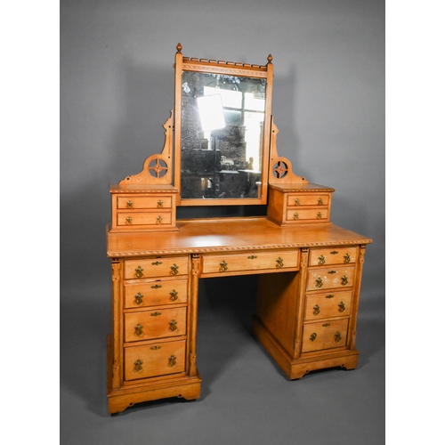 824 - A Victorian inlaid ash Aesthetic Movement mirror backed dressing chest, with an arrangement of nine ... 