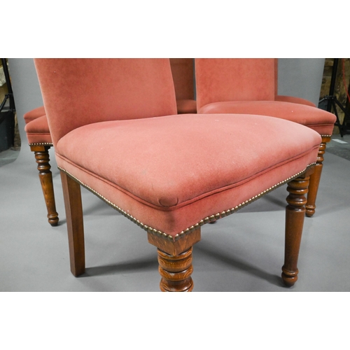 835 - A set of ten contemporary red and cream upholstered high back dining chairs, raised on turned front ... 