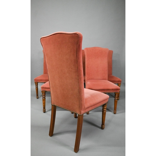 835 - A set of ten contemporary red and cream upholstered high back dining chairs, raised on turned front ... 