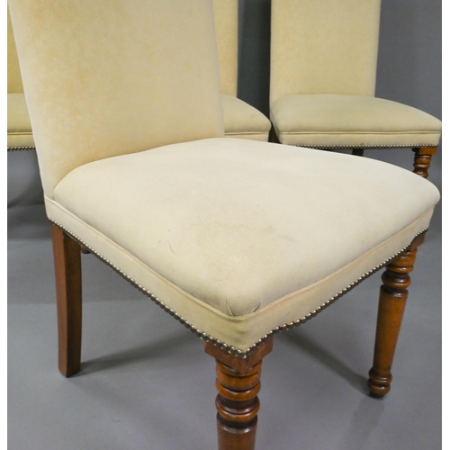 835 - A set of ten contemporary red and cream upholstered high back dining chairs, raised on turned front ... 