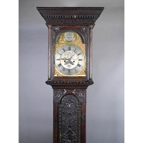 859 - Jarvis, Dalton, an 18th century and later carved oak clock, the eight day movement with arched brass... 