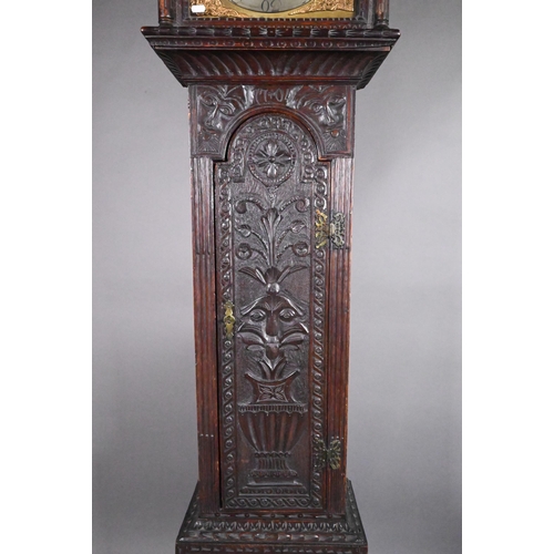 859 - Jarvis, Dalton, an 18th century and later carved oak clock, the eight day movement with arched brass... 