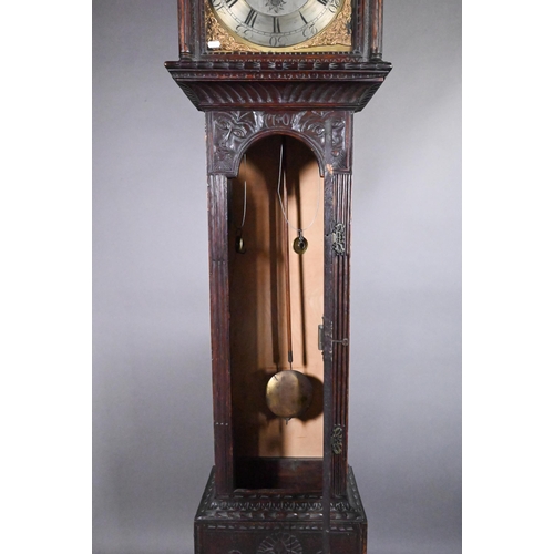 859 - Jarvis, Dalton, an 18th century and later carved oak clock, the eight day movement with arched brass... 