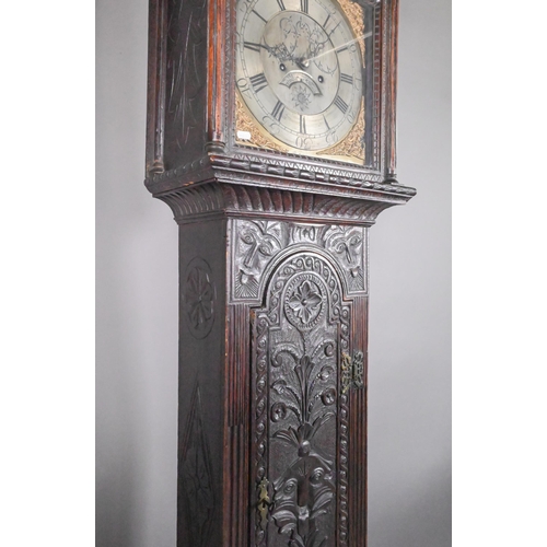 859 - Jarvis, Dalton, an 18th century and later carved oak clock, the eight day movement with arched brass... 