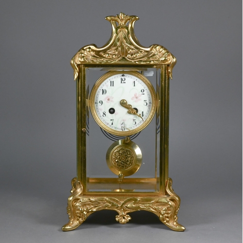 863 - A gilt metal four window mantel clock, the 8-day two train drum movement with white enamelled roman ... 