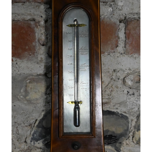 874 - A 19th century mahogany wheel barometer with silvered dial, thermometer, level centred by a convex p... 