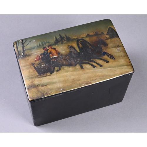 897 - A 19th century Russian lacquered papier maché tea caddy, the cover painted with a family in horse-dr... 