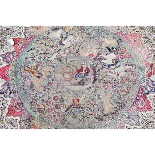 904 - An antique Kayserie circular silk and metal thread rug, Anatolia circa 1900, the field with hunting ... 