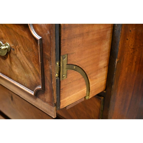 934 - A George III mahogany secretaire library bookcase, the pair of astragal glazed cabinet doors enclosi... 