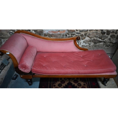 935 - A Victorian mahogany framed upholstered single scroll end chaise, raised on turned legs to brass cas... 