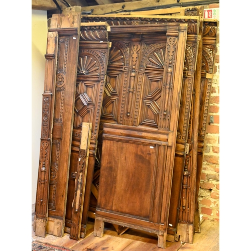 936 - A quantity of Victorian and later composed moulded and carved oak room panelling, incorporating a si... 