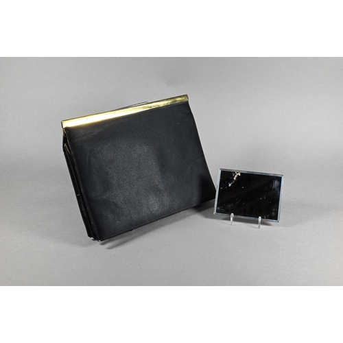 1131 - An Asprey black satin evening bag with silver gilt mount, London 1956 and green silk lining, 18 x 23... 