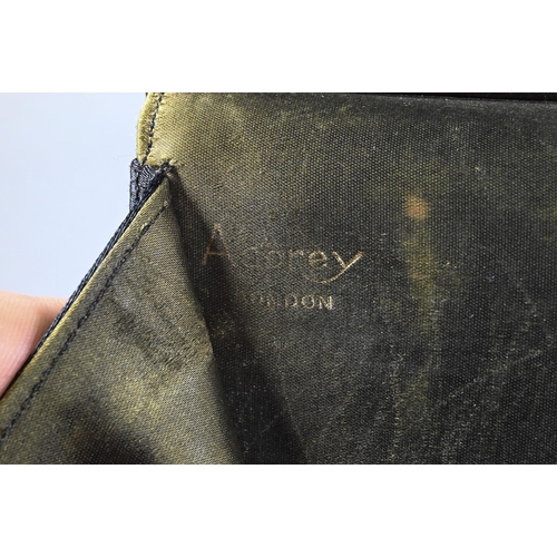 1131 - An Asprey black satin evening bag with silver gilt mount, London 1956 and green silk lining, 18 x 23... 